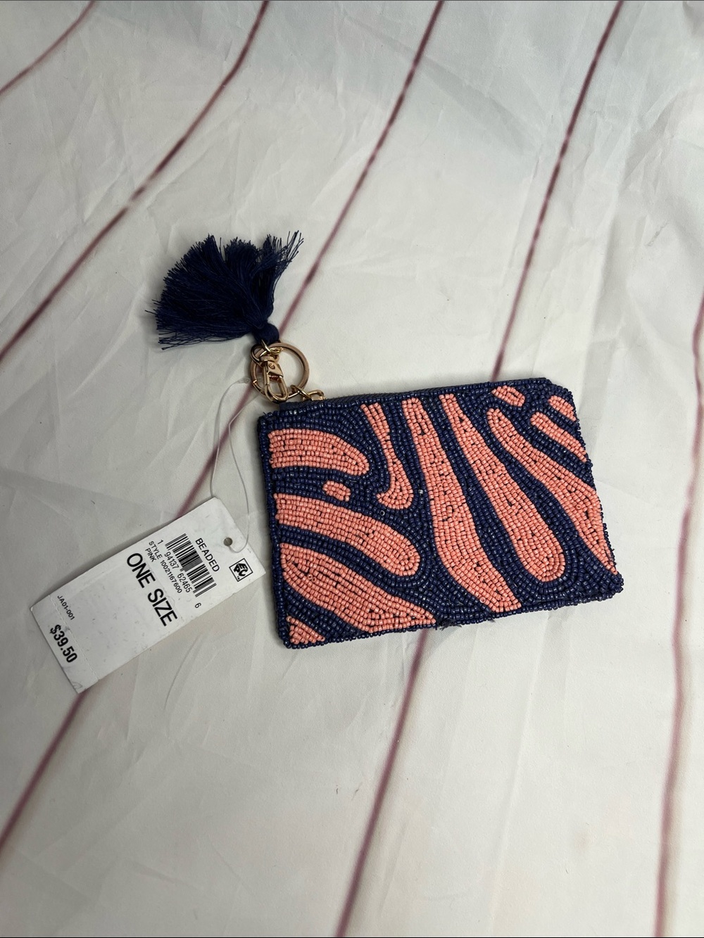 Patterned Wristlet coin purse in coral and Navy with Tassel and key hook